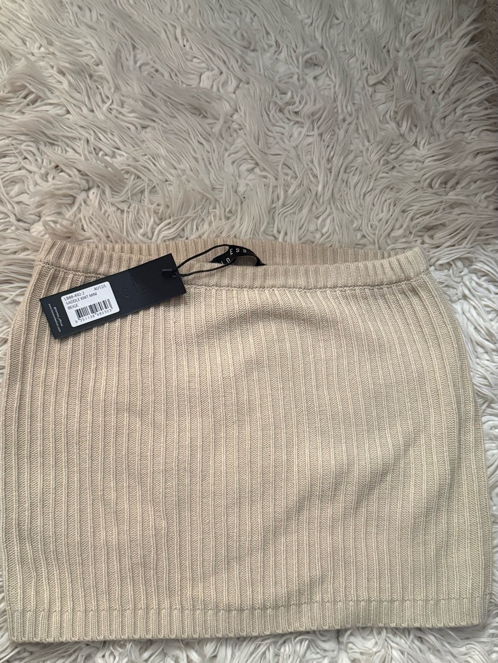 Women’s Ribbed Knit Mini Skirt in Beige - Lioness